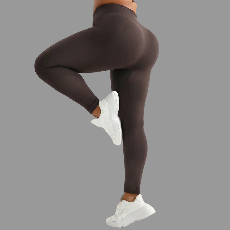 High-waisted butt-lifting yoga pants in coffee brown made from spandex nylon fabric featuring moisture-wicking breathable and high-elastic design for plus size women