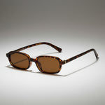 KAoutfits small frame oval sunglasses with a sleek unisex design