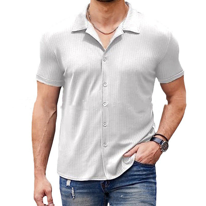 Man wearing men’s casual short sleeve cotton blend polo shirt with button collar and non-iron finish