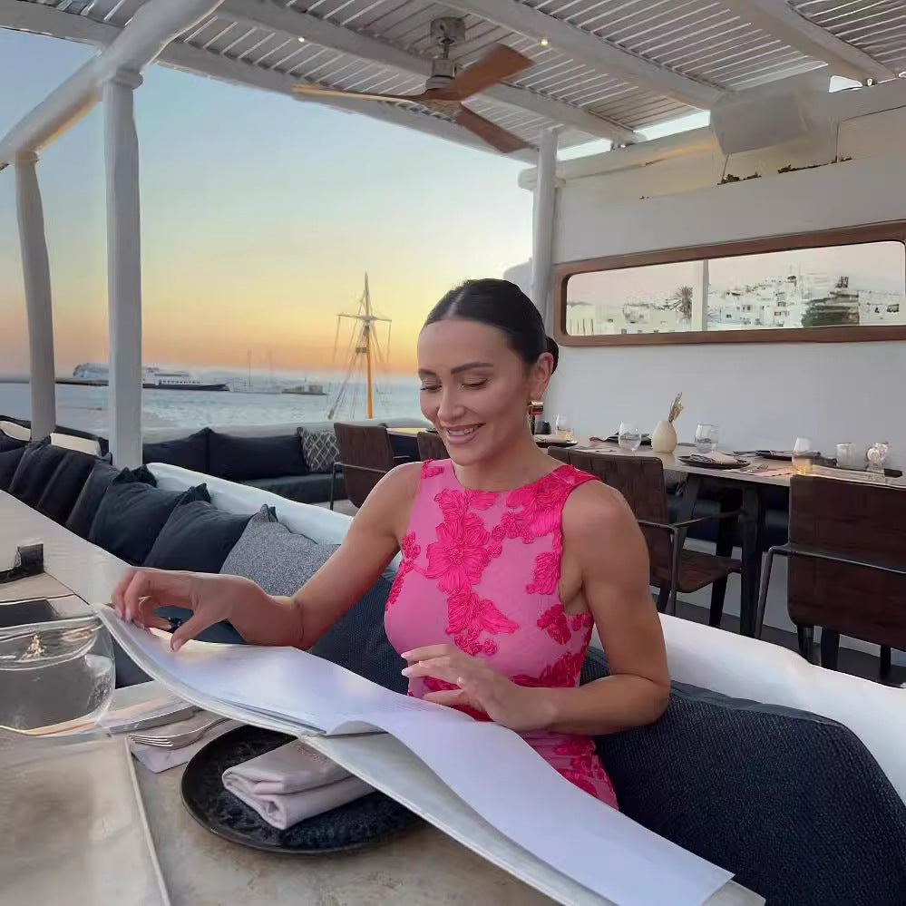 Woman wearing mesh 3D floral embroidered bodycon sheath maxi dress in Rose Red for evening or party events